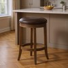 HomeRoots 26" Brown Faux Leather and Solid Wood Backless Counter Height Swivel Bar Chair - 2 of 4