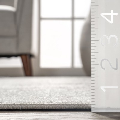 Ivory Rectangular Easy Care Synthetic Area Rug, 52" x 24"