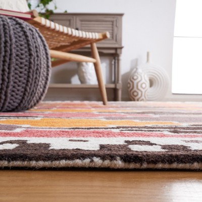 Rodeo Drive 6' x 9' Black and Rust Hand-Tufted Wool Area Rug