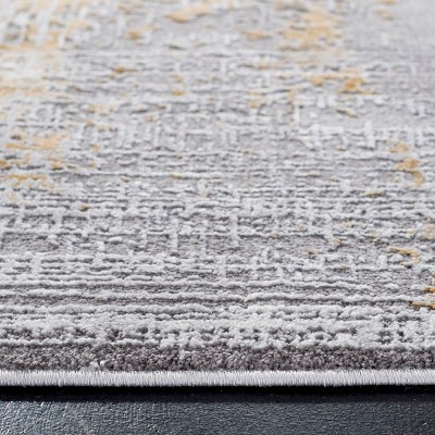 Grey and Beige Abstract Synthetic Area Rug 4' x 6'