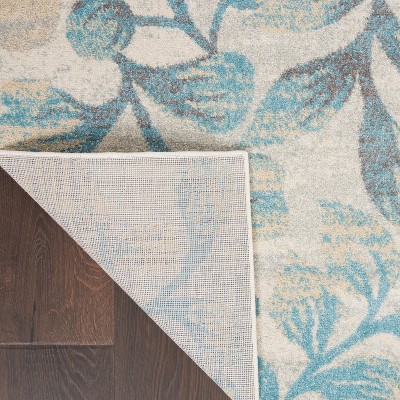 Ivory and Turquoise Floral Synthetic 6' x 9' Area Rug