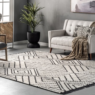 Luxurious Beige Synthetic 6'7" x 9' Shag Area Rug with Modern Diamond Fringe