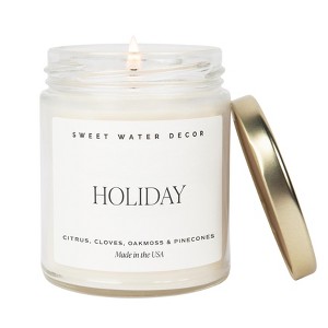 Sweet Water Decor Holiday 9oz Clear Jar Soy Candle - 1 of 3