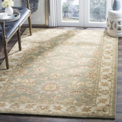 Handmade Green and Gold Wool Persian Area Rug 6' x 9'