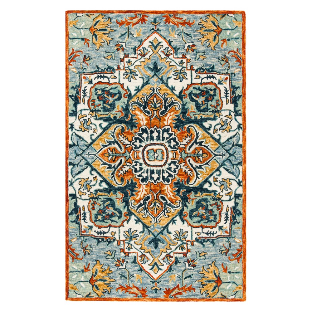 4'x6' Rose Medallion Tufted Area Rug Blue/Rust - Safavieh