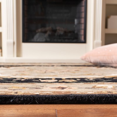 Handmade Black Round Tufted Wool Rug, 3'x5'