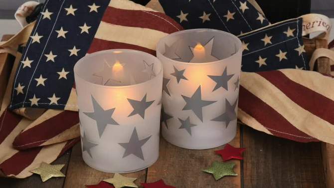 2ct Battery Operated Glass LED Candles with Moving Flame Silver Stars, 2 of 7, play video