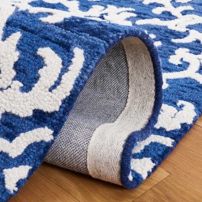 Ivory and Navy Hand Tufted Wool 4' x 6' Area Rug