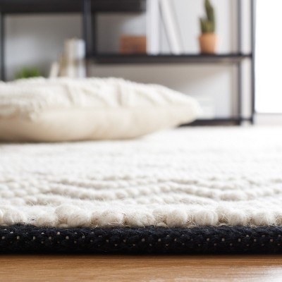 Black and Ivory Hand Tufted Wool 3' x 5' Area Rug