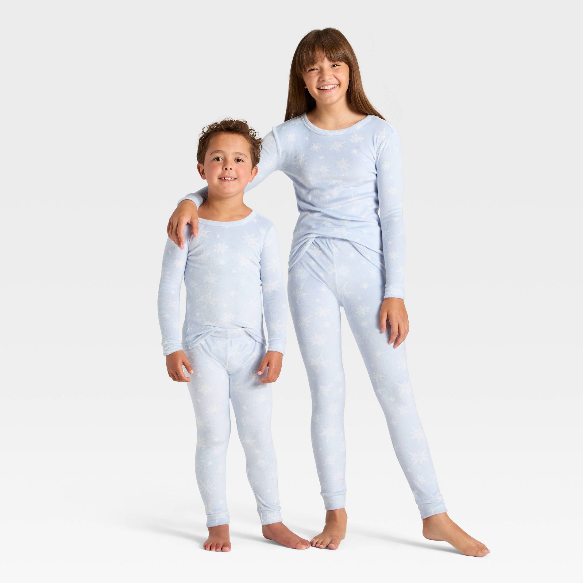 Kids' 2pc Snowflakes Long Sleeve Holiday Snuggly Soft Pajama Set - Cat & Jack™
