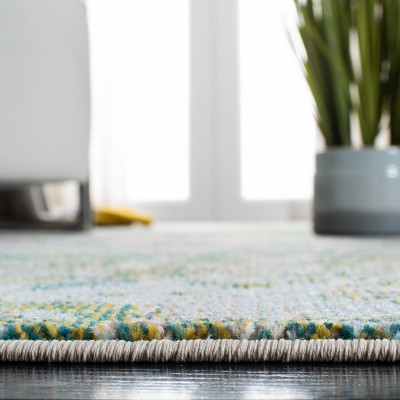 Green and Blue Abstract 4' x 6' Synthetic Area Rug