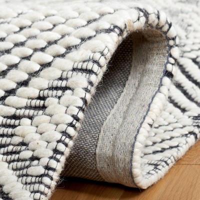 Ivory and Black Flat Woven Wool Rectangular Rug, 5' x 8'