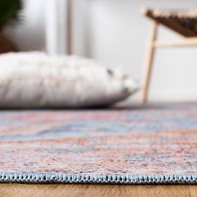 Serapi Blue and Rust Round Washable Viscose Chenille Area Rug