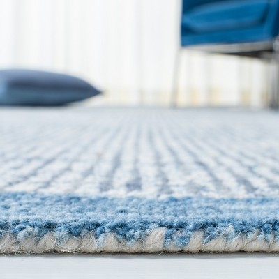 Ivory and Blue Hand-Tufted Wool 4' x 6' Area Rug