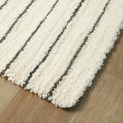 Luxurious Carmody Cream Geometric Synthetic Area Rug 5'3" x 7'