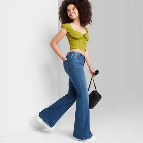 high waist flare jeans with platforms outfit, 7 for all mankind