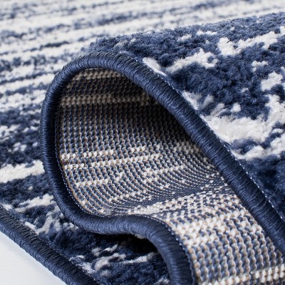 Navy and Ivory Ombre Round Synthetic Area Rug