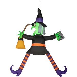 Gemmy Airblown Inflatable Crashing Witch w/Spell Book , 5 ft Tall, Black - 1 of 3