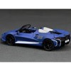 McLaren Elva Convertible #26 Matt Blue with White Stripes and Extra Wheels 1/64 Diecast Model Car by CM Models - 3 of 4
