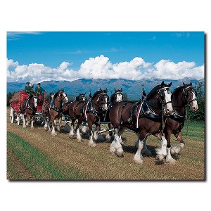 Trademark Fine Art - Clydesdales in Blue Sky Mountains Canvas Art - 1 of 1