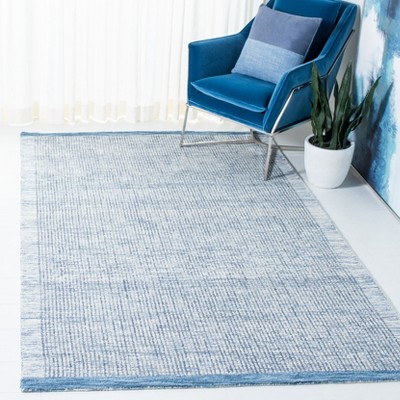 Ivory and Blue Hand-Tufted Wool 4' x 6' Area Rug