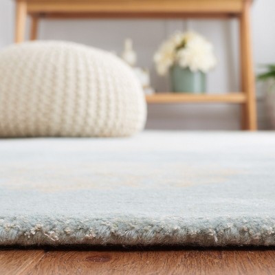 Handmade Turquoise and Yellow Wool Viscose 6' x 9' Area Rug