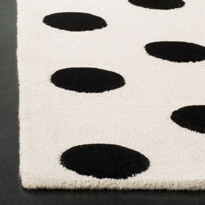 Playful Polka Dot Ivory & Black Hand-Tufted Wool Rug for Kids 5' x 7'