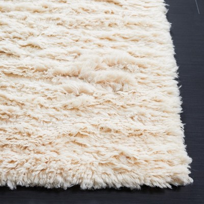 Ivory Hand-Tufted Wool Shag Rug 6' x 9'