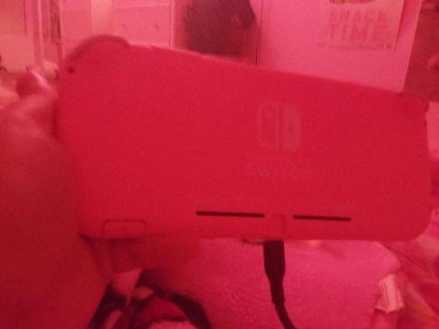 Nintendo Switch Lite - Coral - Hardware - Nintendo - Site officiel