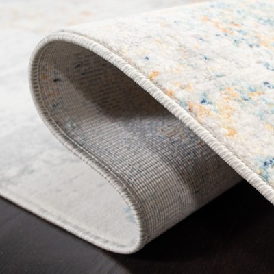 Ivory and Rust Rectangular Synthetic Area Rug