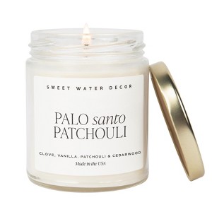 Sweet Water Decor Palo Santo Patchouli 9oz Clear Jar Soy Candle - 1 of 3