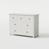 This storage cabinet measures 44.88 inches in size, comes with seven drawers, and is off-white in color. - 3 of 4