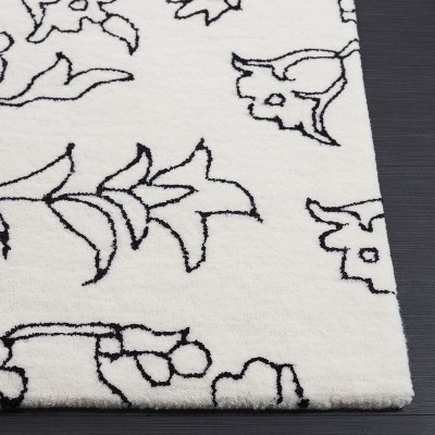 Ivory and Black Floral Tufted Handmade Wool Rug