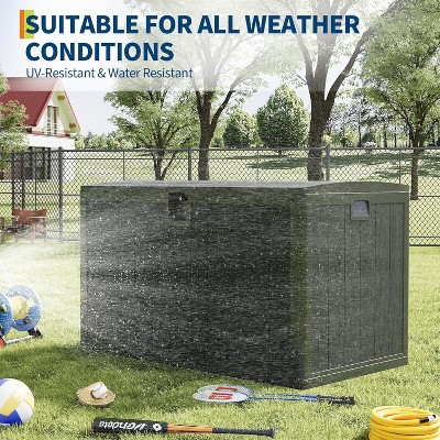 Outdoor storage box placed in yard with sports equipment