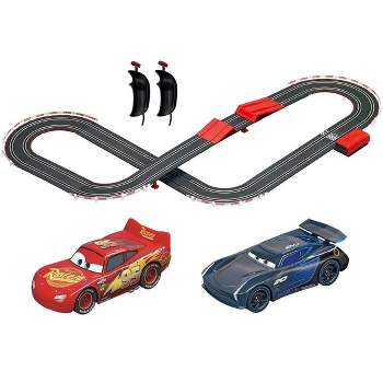 Carrera First Disney/Pixar Cars - Slot Car Race Track - Includes 2 Cars:  Lightning McQueen and Dinoco Cruz - Battery-Powered Beginner Racing Set for