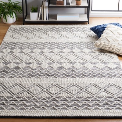 Black and Ivory Hand Tufted Wool 3' x 5' Area Rug