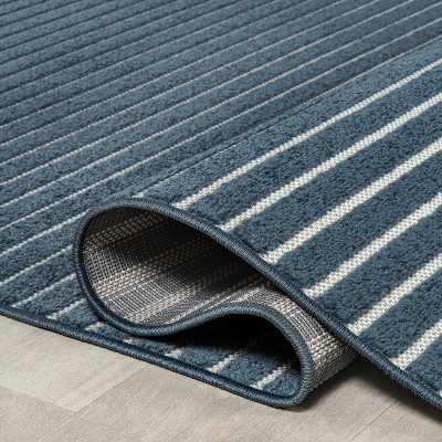 Ivory and Navy Striped Synthetic 4' x 6' Reversible Rug
