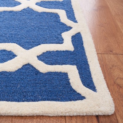 Navy Blue and Ivory Geometric Wool 4' x 6' Area Rug
