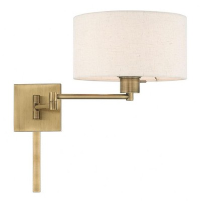 Antique Brass Swing Arm Wall Lamp with Oatmeal Shade