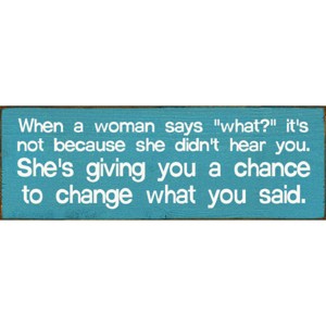 Slickblue When a Woman Says What Sign, 3.5x10 Funny Relationship Quote Plaque, Rustic Knotty Pine Wall or Shelf Decor - 1 of 3