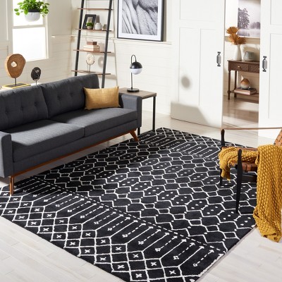 Black and Ivory 6' x 9' Tufted Wool Area Rug