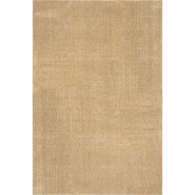 Pastel Orange Solid Machine Washable Synthetic Area Rug