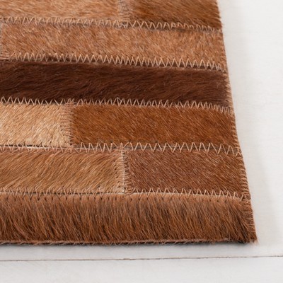 Ivory and Brown Hand-Knotted Geometric Cowhide Area Rug