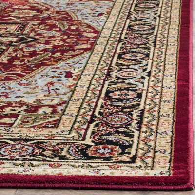 Red and Black Floral 9' x 12' Synthetic Area Rug