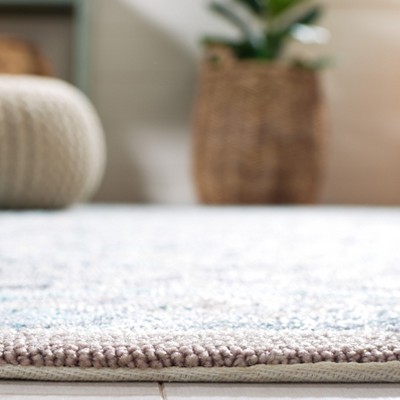 Mint Aqua Floral Hand-Hooked Synthetic Area Rug 6' x 9'
