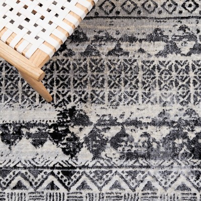 Brentwood Black and Ivory 8' x 10' Synthetic Area Rug