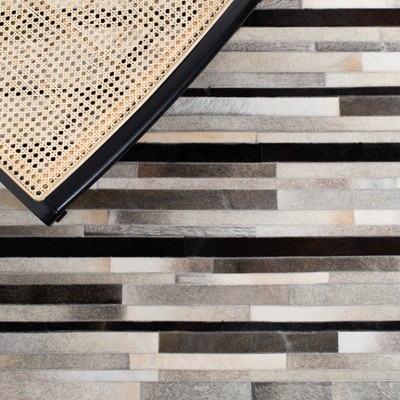 Hand-Knotted Geometric Black Cowhide Rug - 47" x 5"