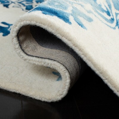 Ivory and Blue Hand-Tufted Wool Area Rug 5' x 8'