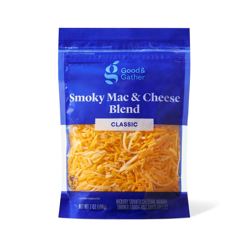 A blue package of Good & Gather Smoky Mac & Cheese Blend containing shredded cheese, labeled as "Classic" with a net weight of 7 oz (198g).