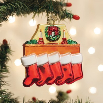 Hand-Painted Glass Christmas Ornament with Five Red Stockings